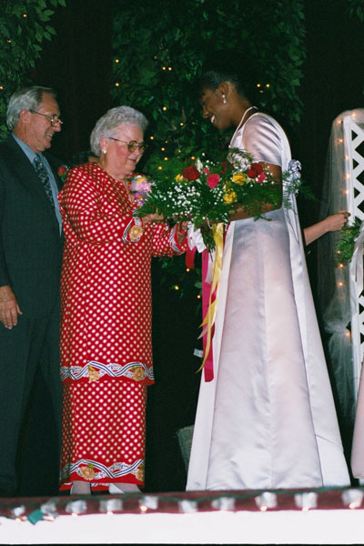 handing over flowers
