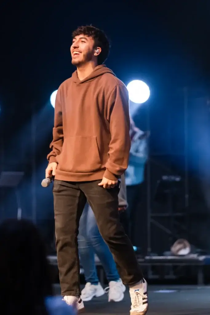 Student leading worship