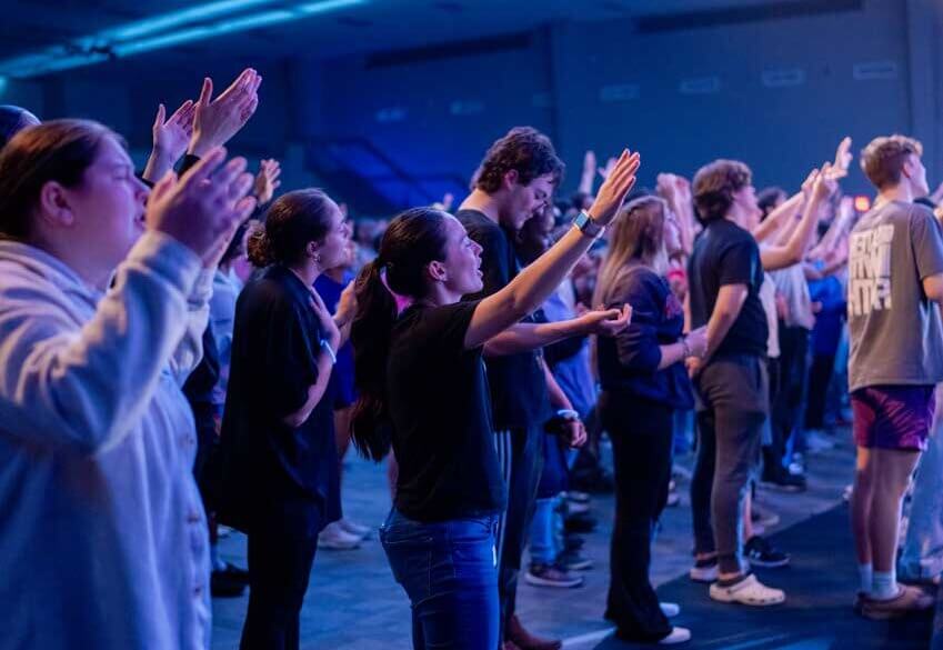 Students worshiping