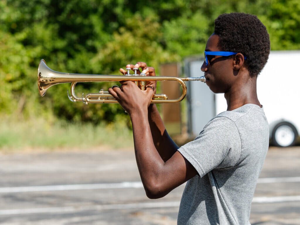 student playing trumpet