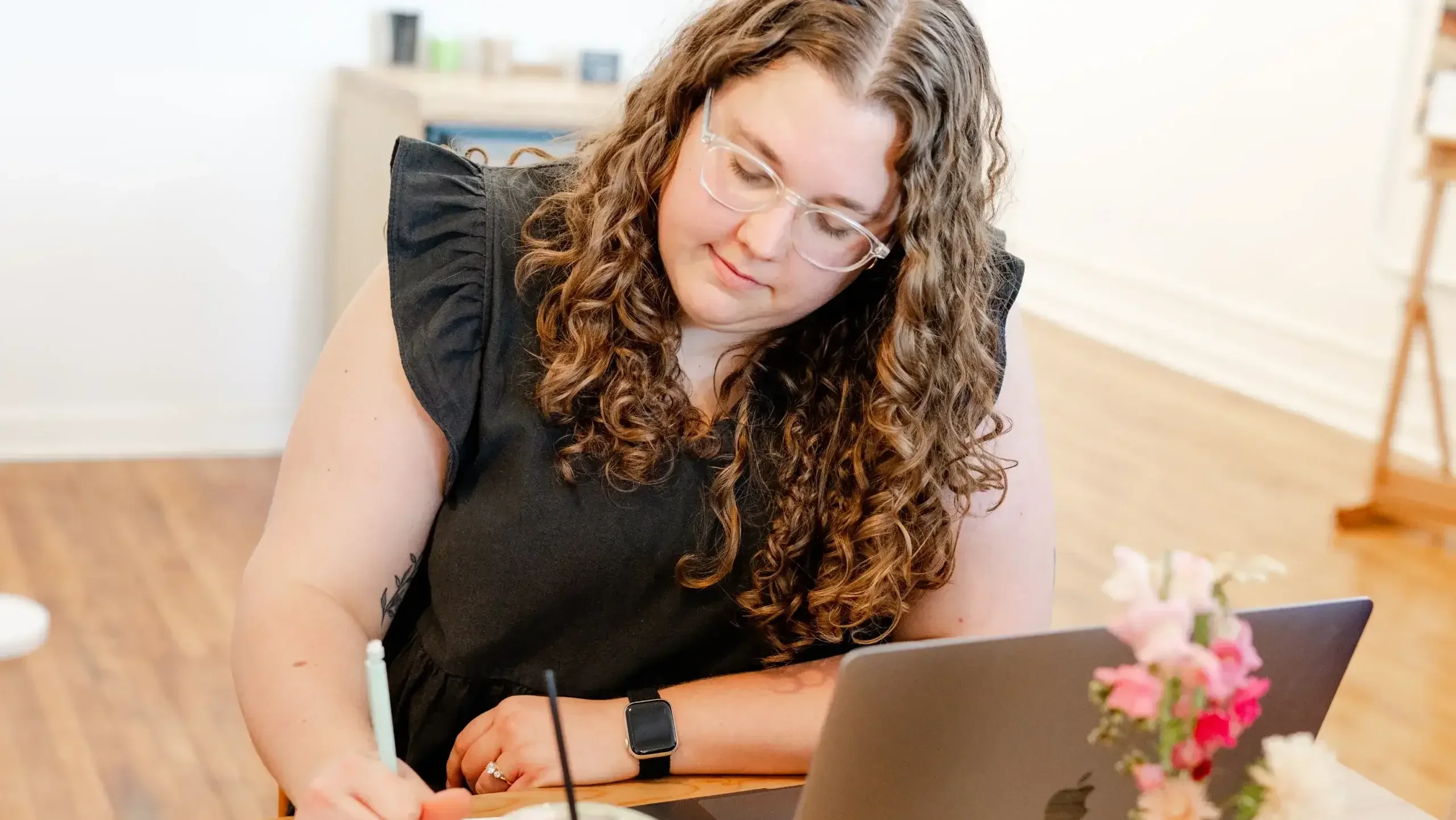 woman studying at table