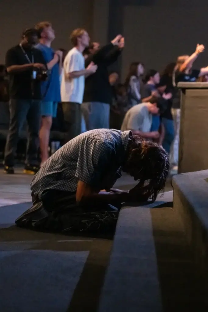 student praying